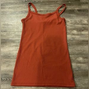 like a burnt orange color. spaghetti straps